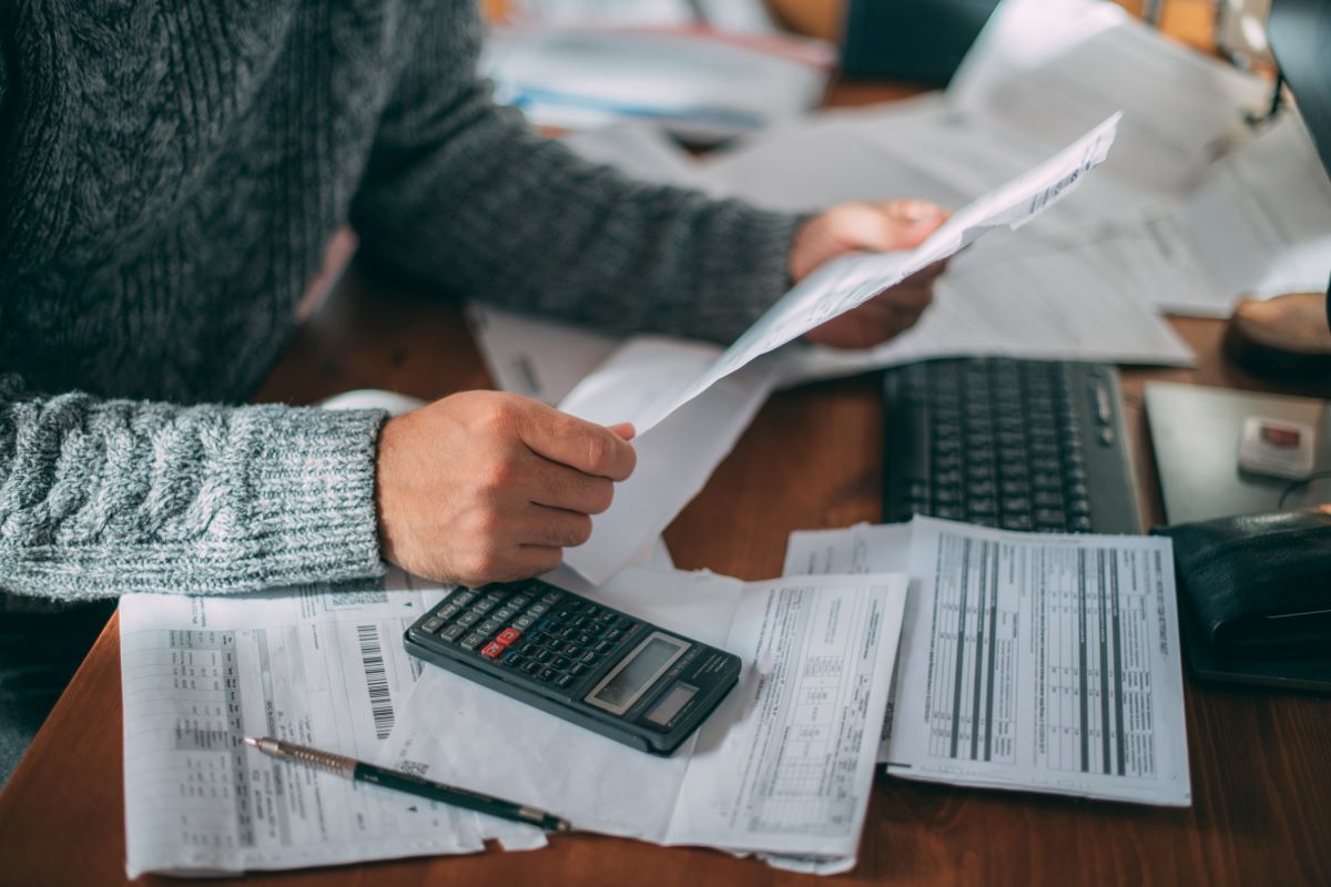 A woman computing her finances.