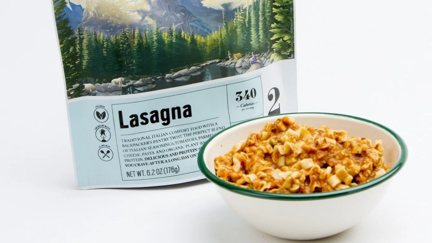 how long does freeze dried food last A tasty freeze-dried lasagna in a bowl beside an opened plastic pack.