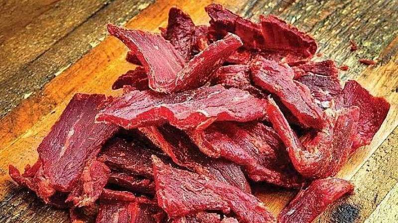 The best foods to dehydrate for long-term storage Dehydrated meat on the table prepared for long-term storage.
